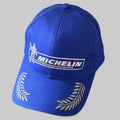 Casquette Michelin Podium bleue avec Bibendum, logo Michelin et lauriers brodés sur la visière – vue de face