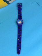 Montre enfant MICHELIN Bibendum vintage bleue avec bracelet à motifs blancs noir