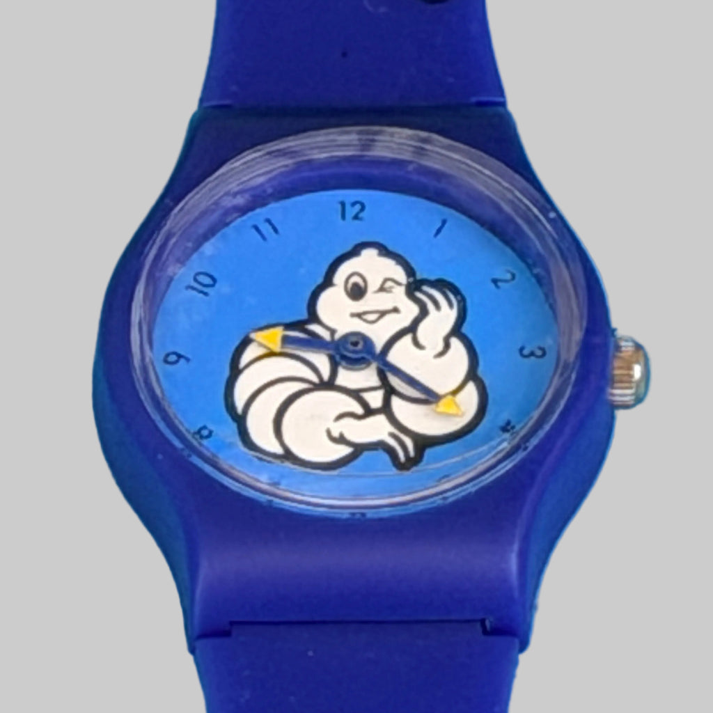Cadran bleu de la montre enfant MICHELIN vintage avec Bibendum