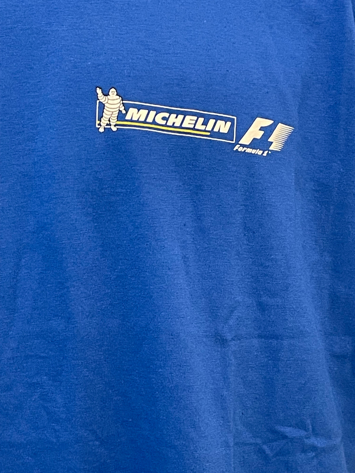 Détail logo Michelin F1 sur T-shirt officiel bleu vintage