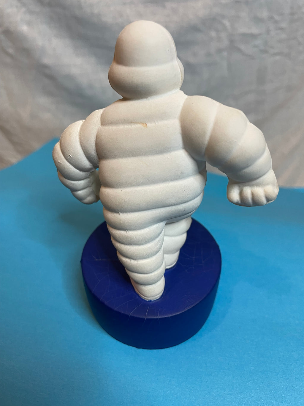 ANCIEN MICHELIN BIBENDUM COUREUR EN MOUSSE