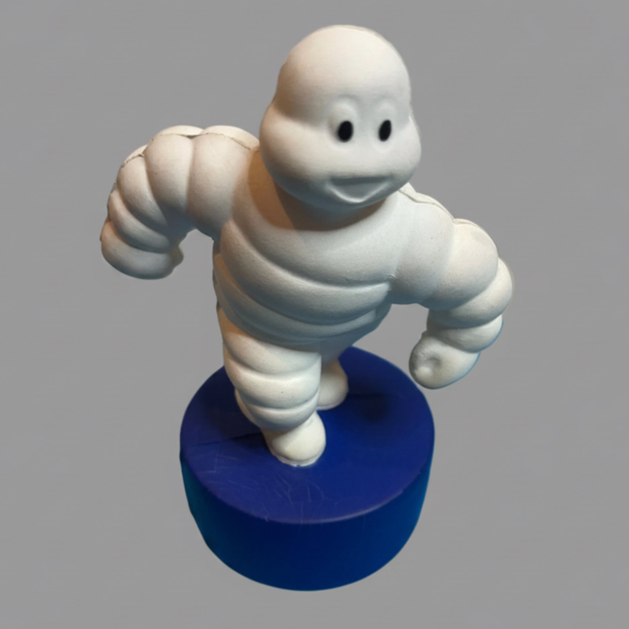 ANCIEN MICHELIN BIBENDUM COUREUR EN MOUSSE