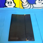 Intérieur porte-documents Michelin vintage avec compartiments