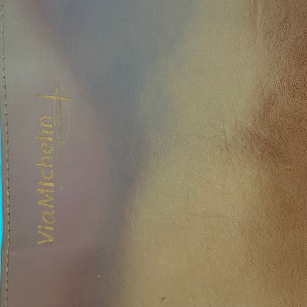 Marquage Michelin sur porte-documents vintage en cuir marron