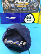 Vue arrière de la casquette Michelin Formula 1 avec logos Bibendum Michelin et F1 brodés.