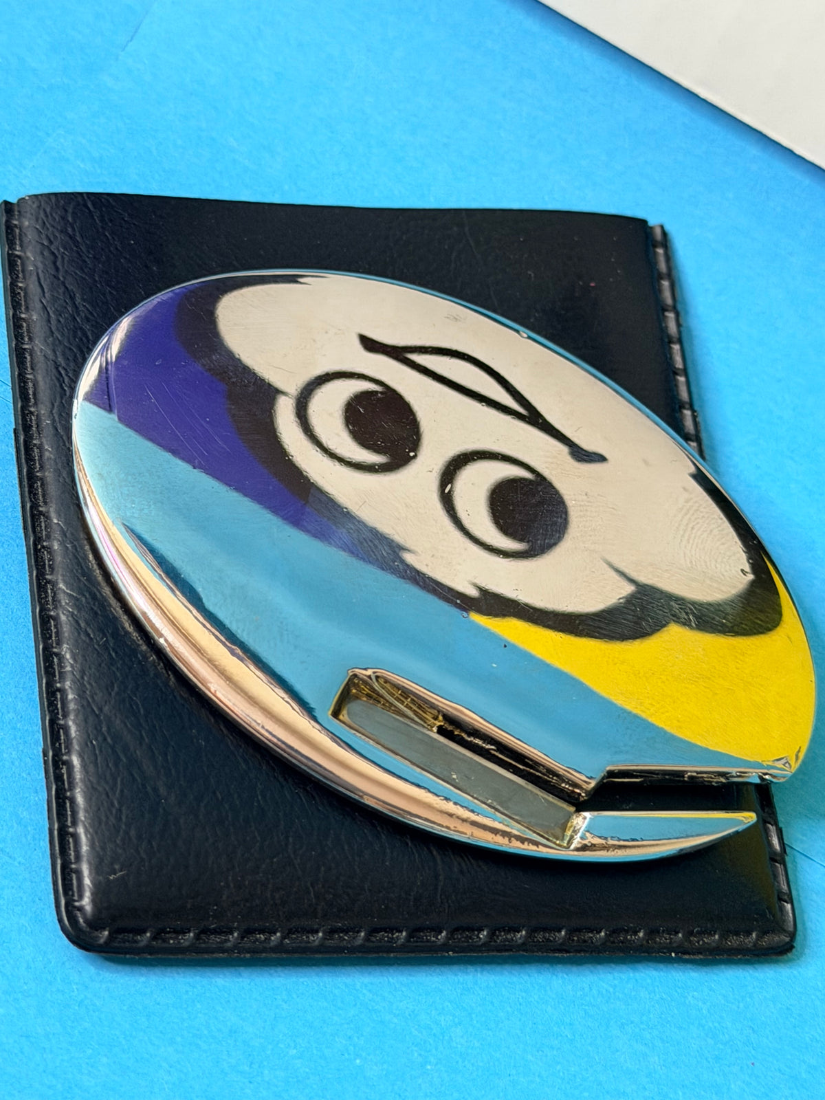 Décapsuleur Michelin Bibendum avec sa pochette noire de protection