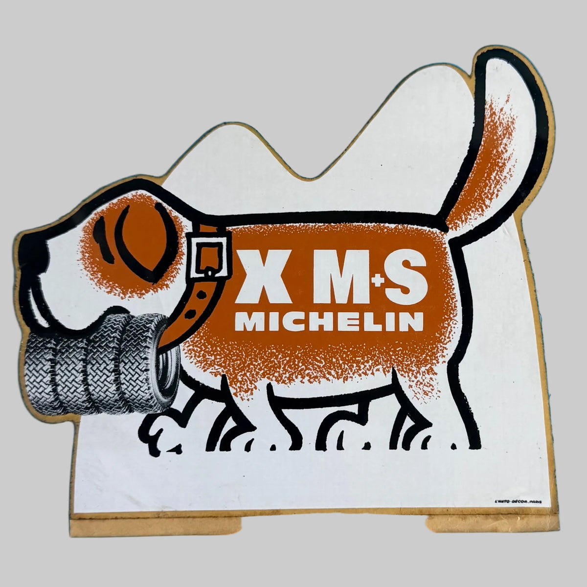 Autocollant vintage Michelin X M+S représentant un chien portant des pneus, référence 2968.