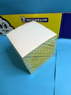 Bloc publicitaire Michelin neuf avec décoration bleu et jaune sur plusieurs faces