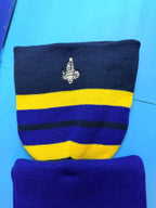 Détail du Bibendum Michelin brodé sur l’ensemble textile Collector bleu et jaune