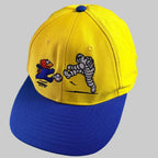 Casquette Michelin France 98 neuve, jaune avec visière bleue, broderies Footix et Bibendum jouant au football sur la face avant.