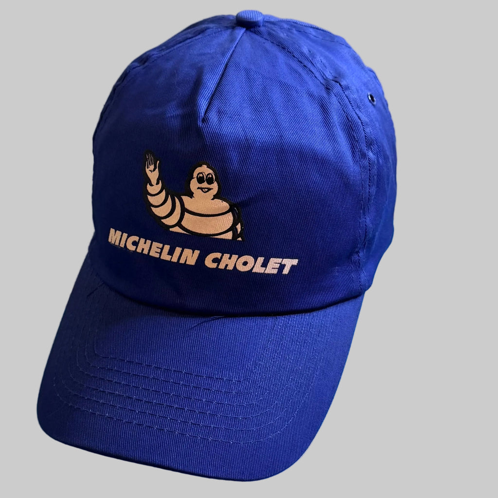 Casquette Michelin Cholet neuve bleu royal avec Bibendum et inscription blanche sur la face avant.