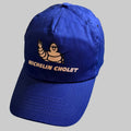 Casquette Michelin Cholet neuve bleu royal avec Bibendum et inscription blanche sur la face avant.