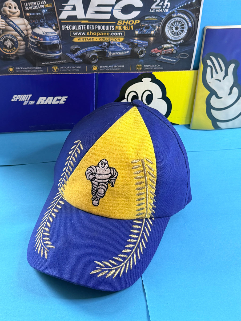 Casquette collector Michelin Podium avec Bibendum central et broderies de lauriers dorés – vue de face