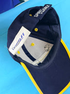 Détail intérieur de la casquette Michelin F1 avec étiquette Michelin Formula 1 d’origine et réglage Spirit of the Race