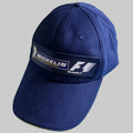Casquette Michelin Formula 1 neuve bleu marine avec grand logo Michelin F1 imprimé sur support plastique à l’avant.
