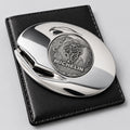 Décapsuleur Michelin Bibendum chromé présenté avec sa pochette noire