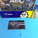 Dos du fascicule Michelin Championnat du monde des rallyes 2003, illustré de plusieurs voitures de rallye, document publicitaire et sportif d'époque destiné aux collectionneurs.