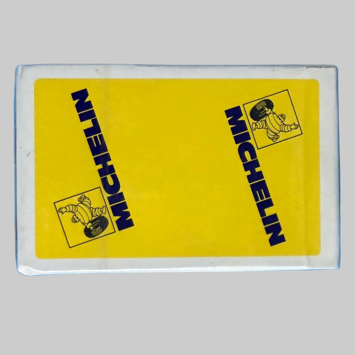 Jeu de 54 cartes de luxe Michelin neuf sous emballage d'origine, coffret jaune avec logos bleus Michelin et illustrations Bibendum.