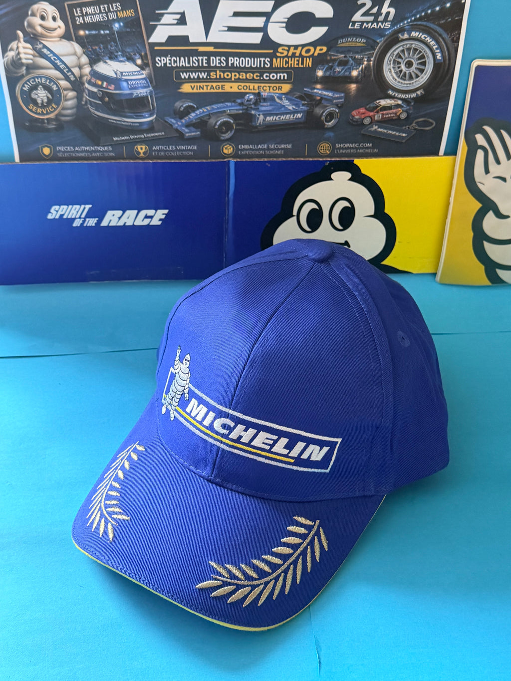 Casquette collector Michelin Podium bleue avec logo Bibendum et broderies lauriers – collection AEC Shop
