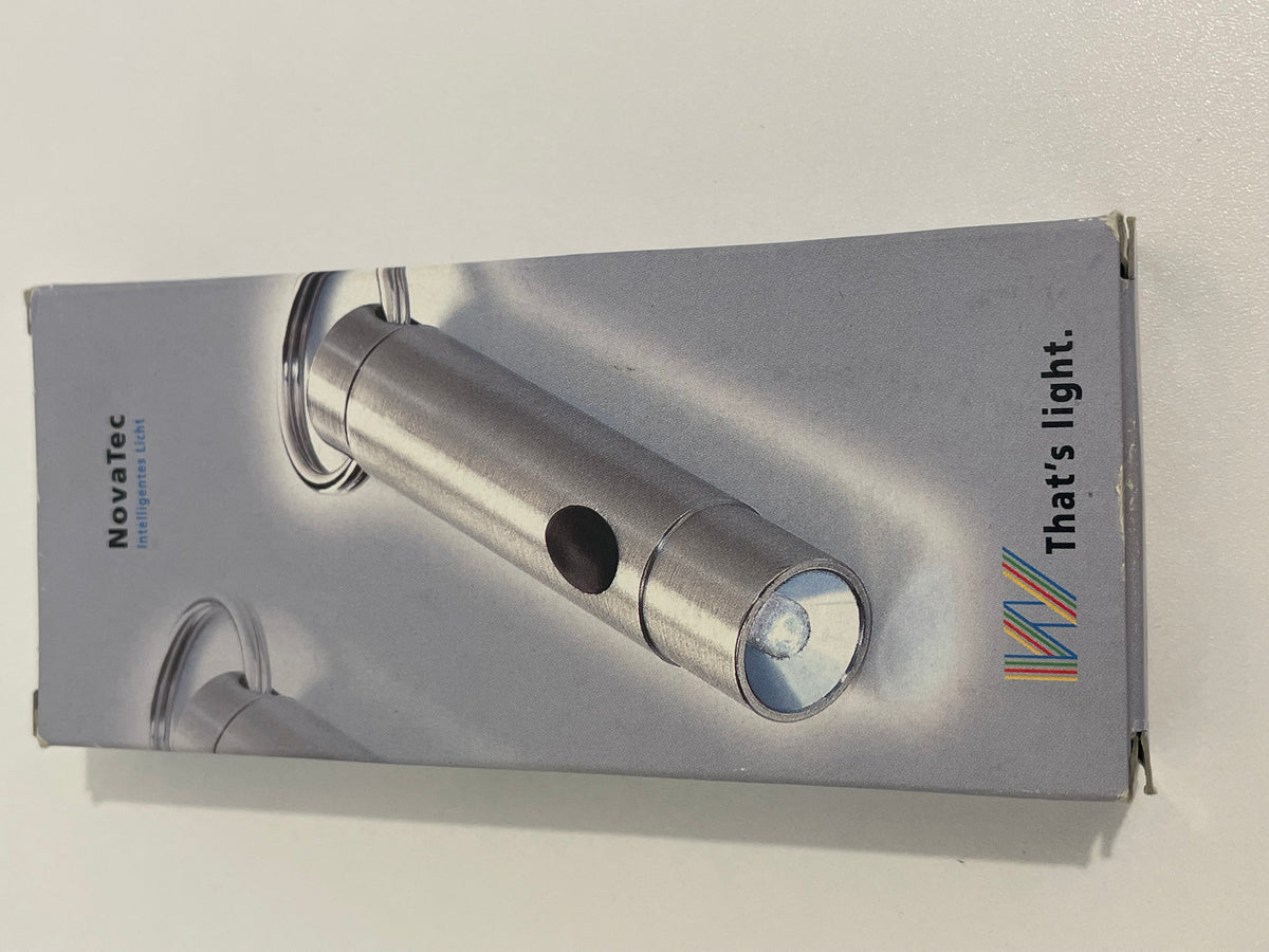 Lampe de poche Michelin en métal présentée dans son emballage d’origine