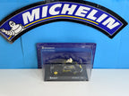 Peugeot 202 miniature publicitaire Michelin dans son coffret de présentation, modèle réduit de voiture française ancienne.