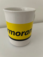 Mug publicitaire Kormoran neuf avec large bande jaune et inscription Kormoran