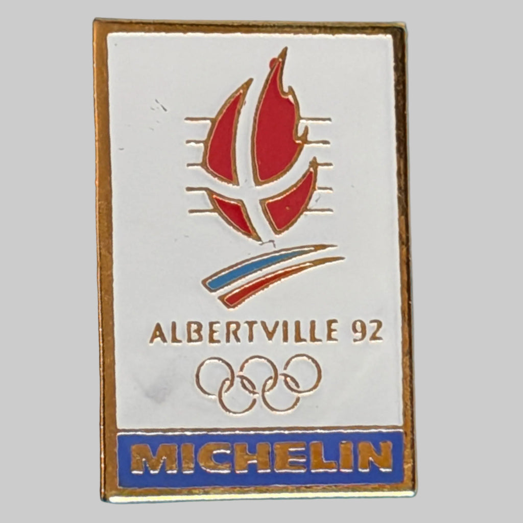 Pin’s Michelin Albertville 92 Jeux Olympiques d’hiver 1992 – vue de face avec logo Michelin et anneaux olympiques