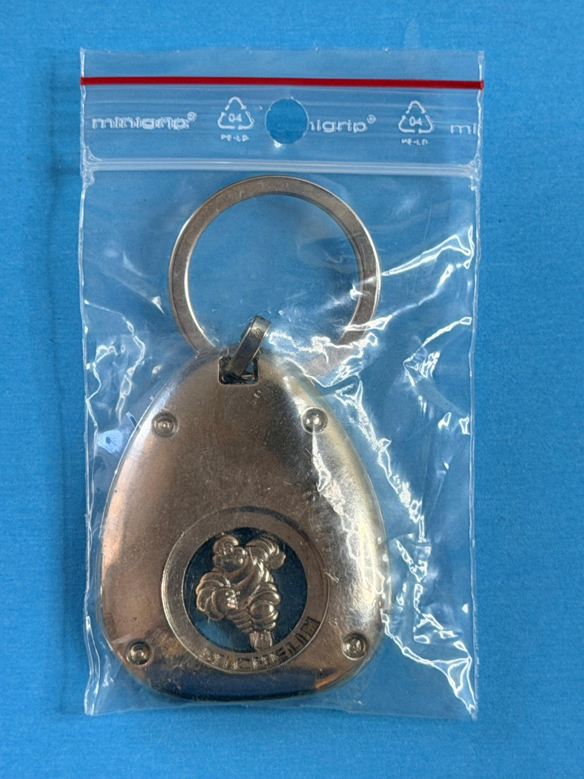 Porte-clés Michelin Bibendum de collection présenté dans son sachet de protection