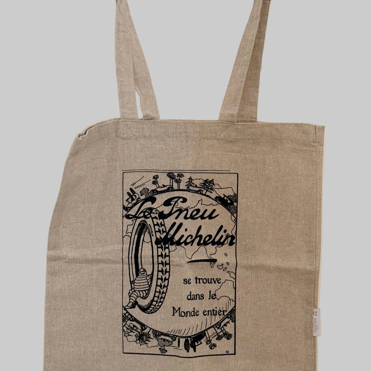 Sac cabas Michelin beige avec illustration publicitaire vintage Bibendum.