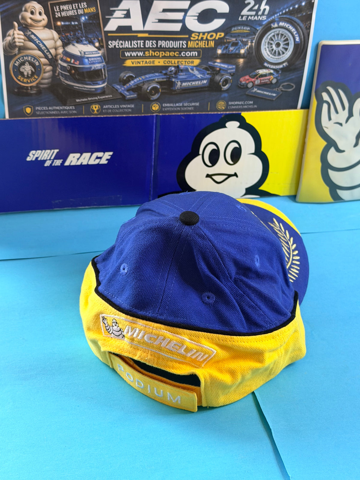 Vue arrière casquette Michelin Podium neuve bleu jaune avec logo Michelin et réglage Podium