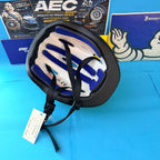 Casque Michelin enfant vu de dessous avec rembourrage bleu, fermeture réglable et étiquette d'origine.