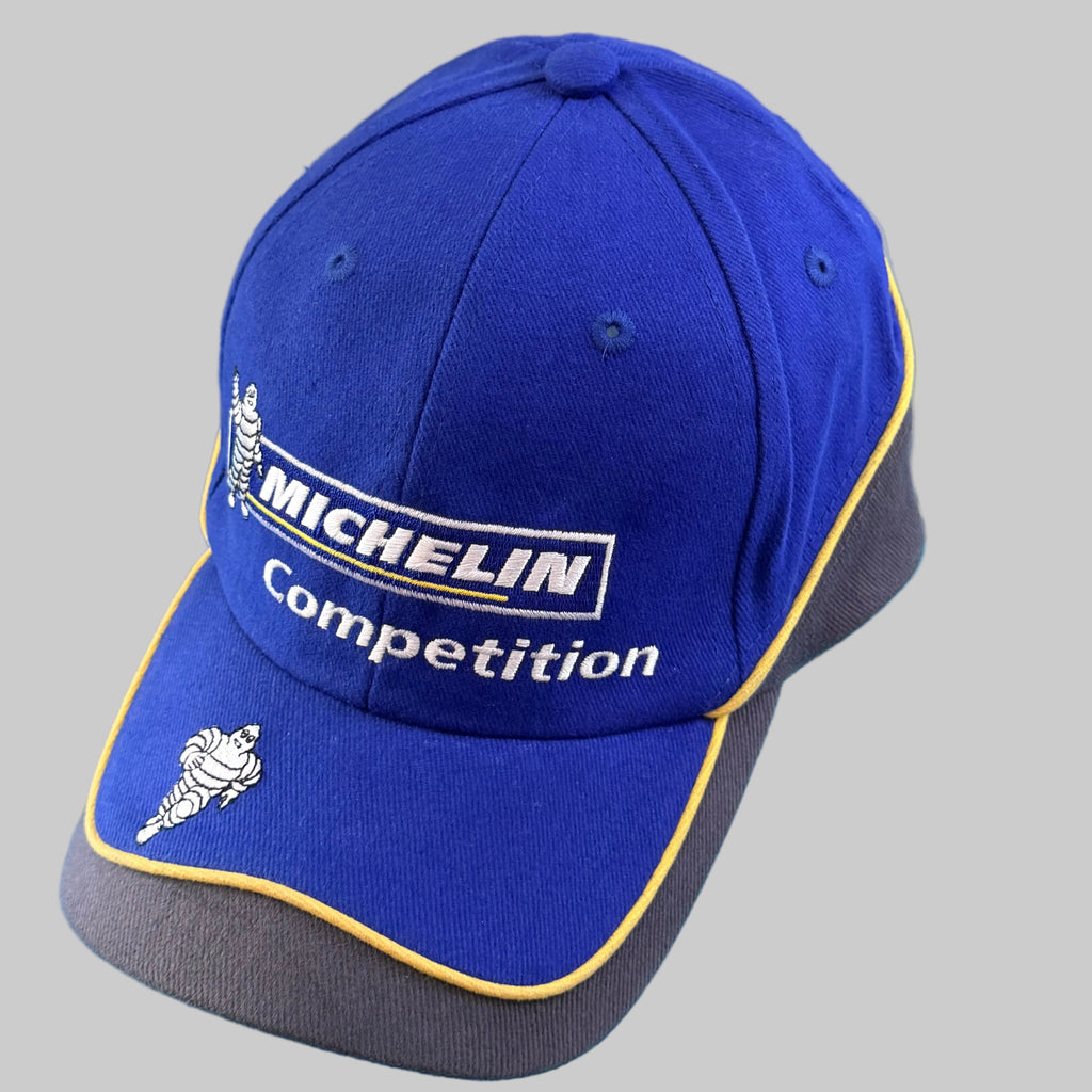 Casquette Michelin Competition neuve bleu et gris avec logo Michelin et Bibendum brodés sur la visière.