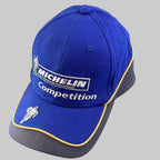 Casquette Michelin Competition neuve bleu et gris avec logo Michelin et Bibendum brodés sur la visière.