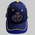 Superbe broderie du Bibendum Michelin sur fond bleu marine, sublimée par les finitions jaunes.