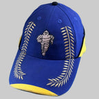 Casquette Michelin Podium neuve bleu et jaune avec Bibendum et lauriers brodés sur la visière