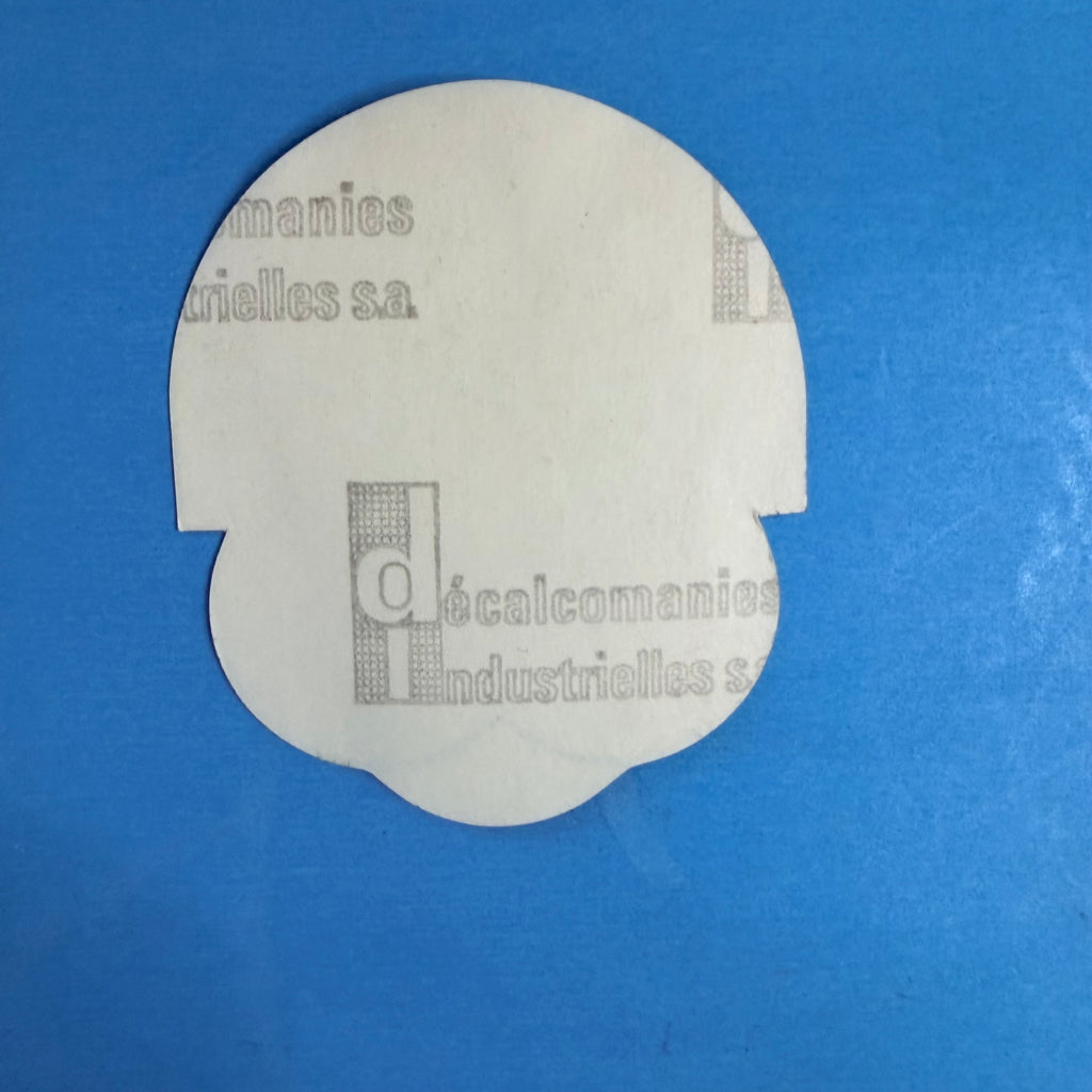 Verso de l'autocollant Michelin Rapido vintage avec papier de protection adhésif d'origine.