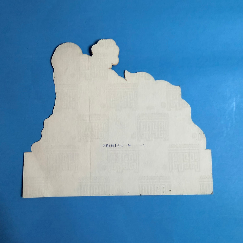 Verso de l’autocollant Michelin Bibendum à découpe originale, avec support papier blanc.