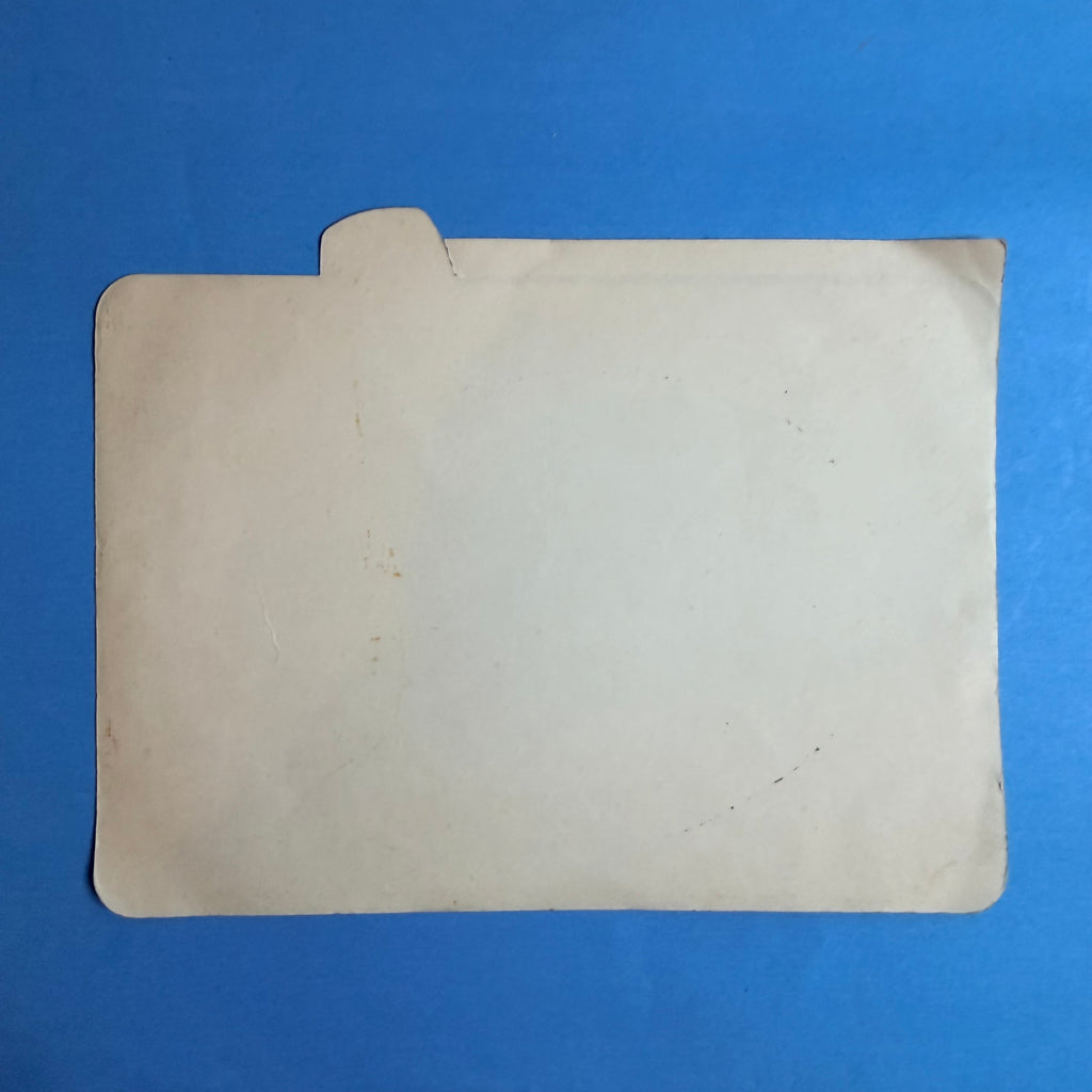 Verso de l’autocollant publicitaire Michelin ZX vintage, montrant son support ancien et ses traces de conservation.