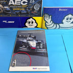 Publicité Mobil 1 d'époque mettant en scène une McLaren-Mercedes de Formule 1. Un document publicitaire représentatif du sport automobile de 2003.