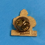 Dos du pin's Michelin Bibendum en métal doré texturé avec fixation papillon.