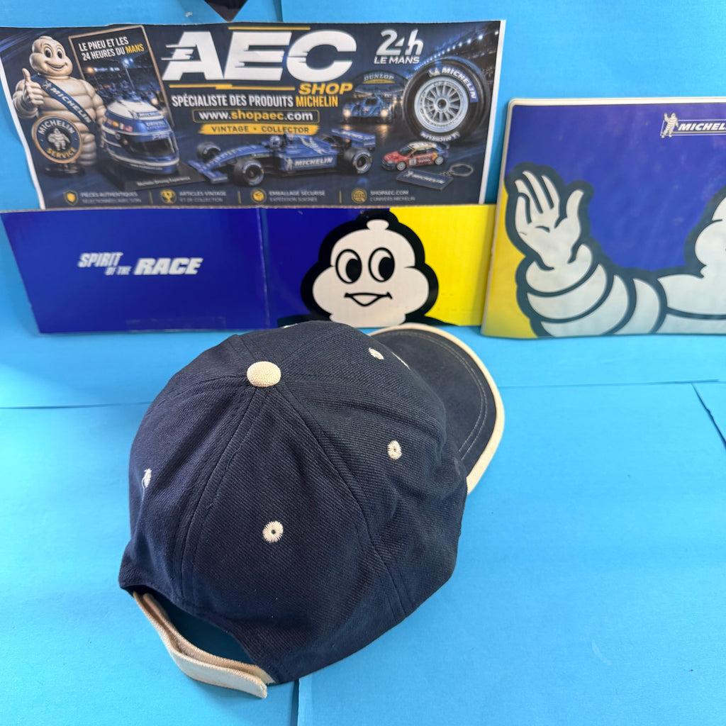 Vue arrière de la casquette Michelin bleu marine avec œillets brodés et fermeture réglable.